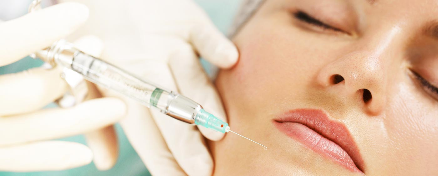 Close‑up of woman receiving an aesthetic injection at our Birmingham clinic