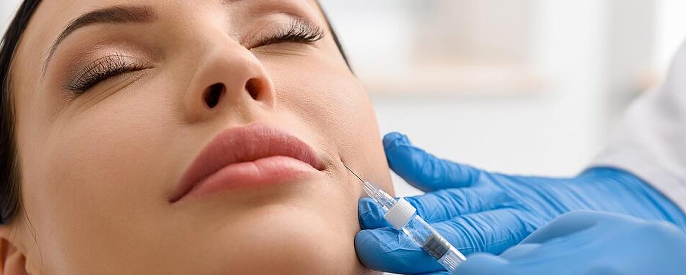 Dermal filler injection into lips at our Birmingham aesthetics clinic
